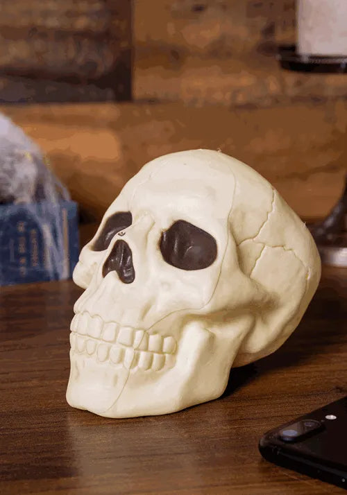 4-Inch Glow in the Dark Small Skull Decoration Main image